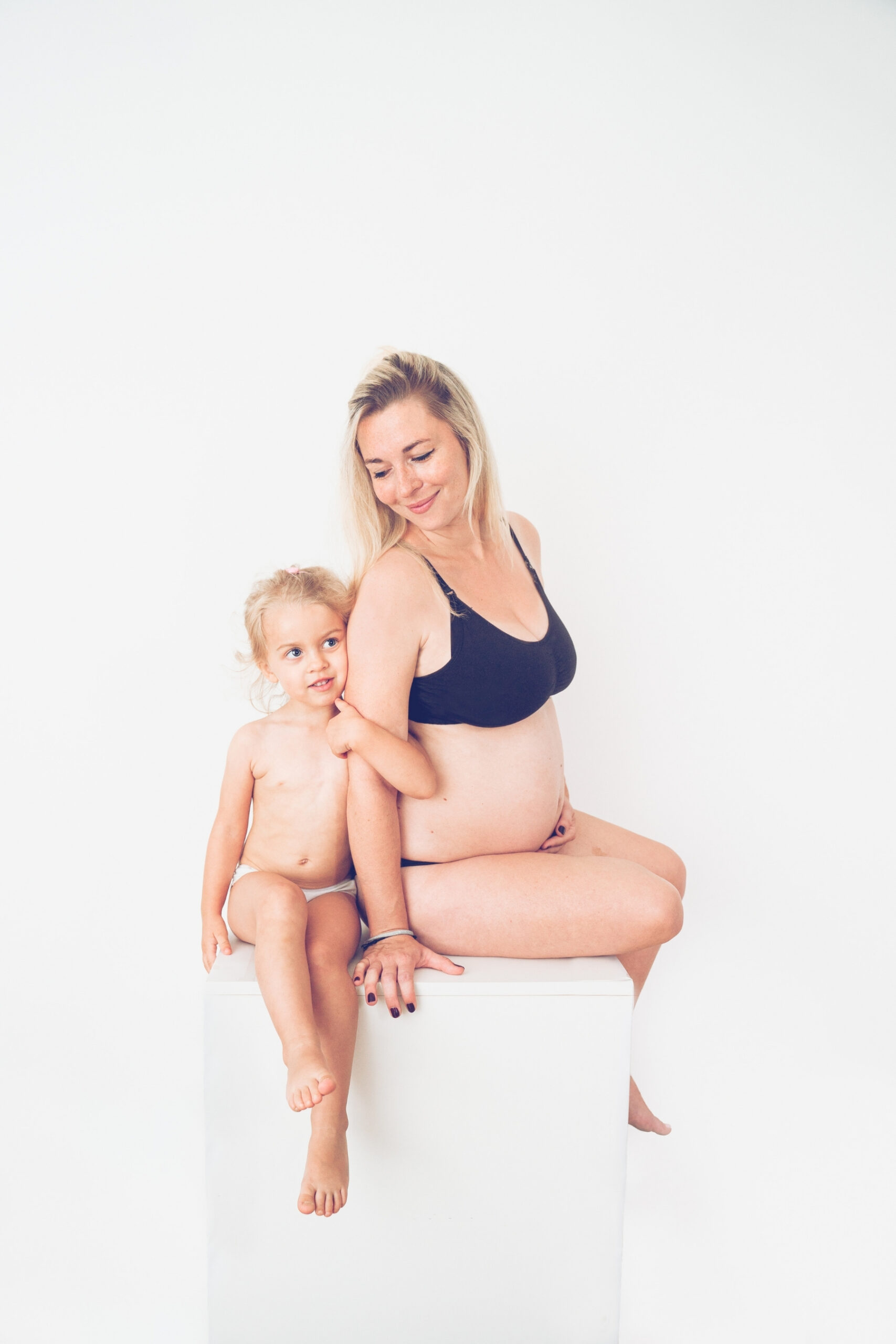 Photographie de grossesse et nouveau-né