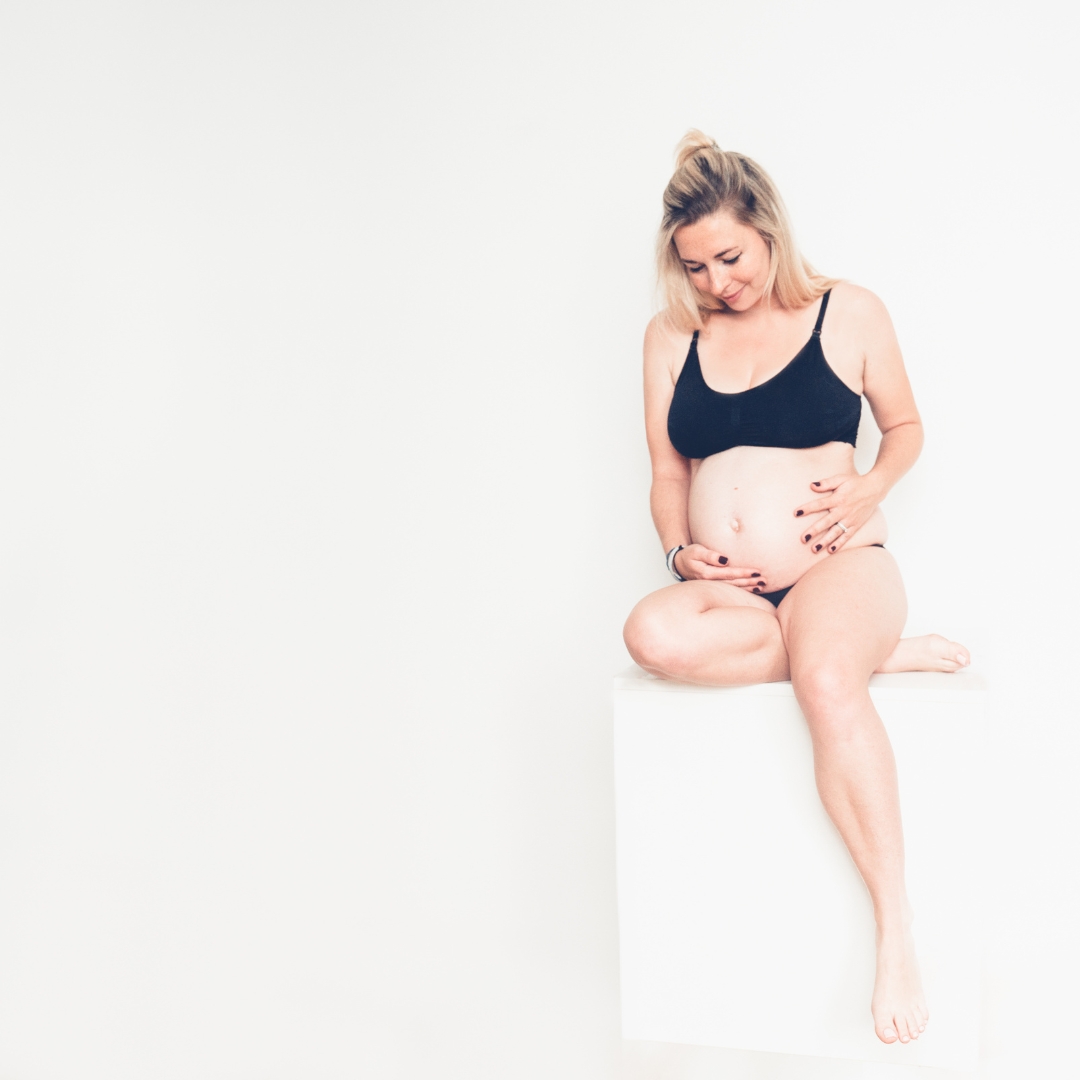 Photographie de grossesse et nouveau-né